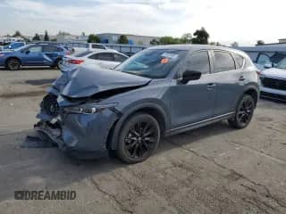 2022 Mazda CX-5 S Preferred z VIN JM3KFBCM5N0649065, wystawiony jako Copart lot #70552485 z przebiegiem Nie podano mil oraz Szkoda całkowita • Salvage title. Historia ofert i sprzedaży dostępna na DreamBid. Obrazek 1.
