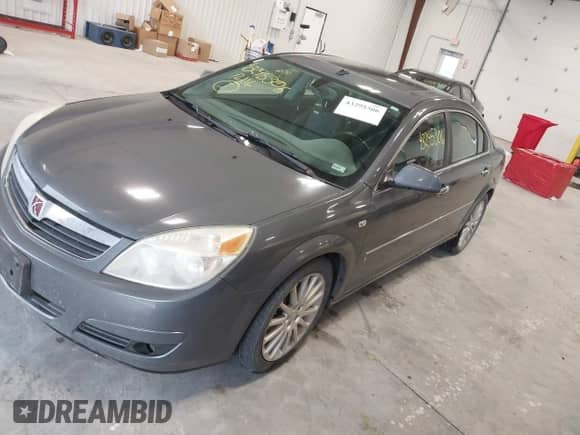 2007 Saturn Aura XR with VIN 1G8ZV57747F210983, listed as a IAAI auction lot 43295306 with 173,210 mi miles and . Bid and sale history available at DreamBid. Image 2.
