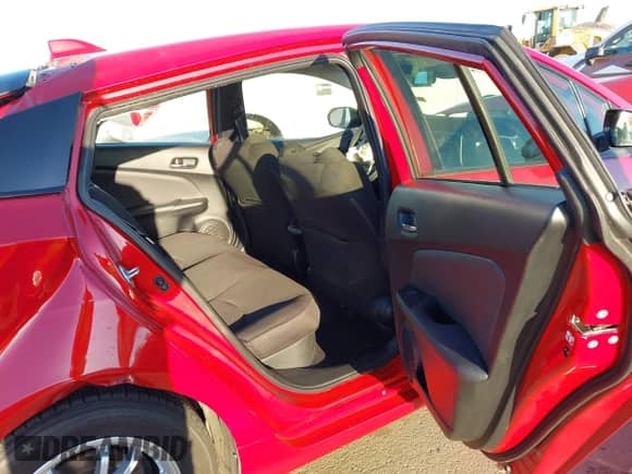 2021 Toyota Prius L Eco with VIN JTDKAMFU6M3152201, listed as a IAAI auction lot 43278670 with 144,414 mi miles and . Bid and sale history available at DreamBid. Image 8.