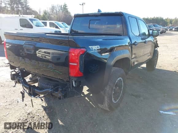 2024 Toyota Tacoma SR5 with VIN 3TMLB5JN0RM008463, listed as a IAAI auction lot 40979020 with 4,710 mi miles and . Bid and sale history available at DreamBid. Image 4.