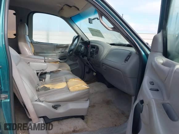 1997 Ford F-150 XL z VIN 1FTEX17L1VNB11979, wystawiony jako IAAI lot #43384566 z przebiegiem 202 543 mil mil oraz . Historia ofert i sprzedaży dostępna na DreamBid. Obrazek 5.