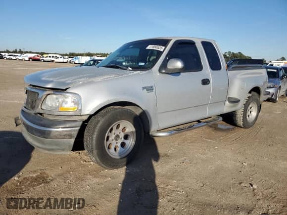 1999 Ford F-150 XL with VIN 2FTRX07W1XCA03134, listed as a Copart auction lot 41880835 with Not provided miles and Salvage title. Bid and sale history available at DreamBid. Image 1.
