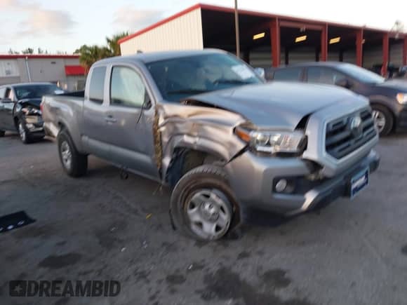 2018 Toyota Tacoma SR with VIN 5TFRX5GN8JX117075, listed as a IAAI auction lot 41723001 with 67,559 mi miles and . Bid and sale history available at DreamBid. Image 1.