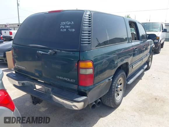 2002 Chevrolet Suburban LT z VIN 1GNEC16Z52J330522, wystawiony jako IAAI lot #42251636 z przebiegiem 292 936 mil mil oraz . Historia ofert i sprzedaży dostępna na DreamBid. Obrazek 4.