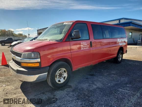 2012 Chevrolet Express Passenger 1LT with VIN 1GAZG1FA2C1182672, listed as a Copart auction lot 82730535 with 183,286 mi miles and Non repairable. Bid and sale history available at DreamBid. Image 1.