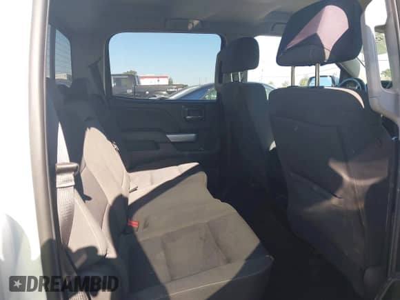 2018 Chevrolet Silverado 1500 LT with VIN 1GCUKRECXJF180945, listed as a IAAI auction lot 42450588 with 108,199 mi miles and . Bid and sale history available at DreamBid. Image 8.
