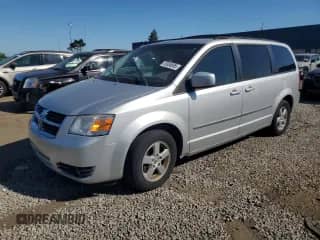 2010 Dodge Grand Caravan SXT with VIN 2D4RN5DX9AR139311, listed as a Copart auction lot 70304695 with 142,919 mi miles and Salvage title. Bid and sale history available at DreamBid. Image 1.