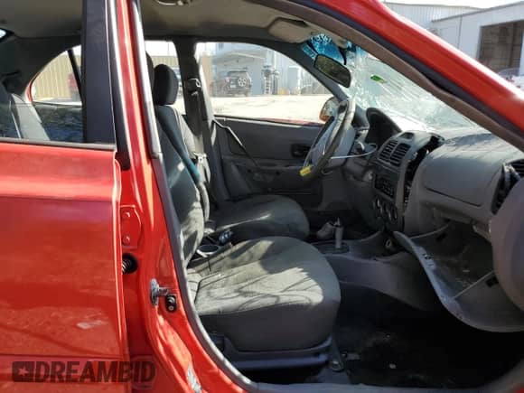 2005 Hyundai Accent GLS с VIN KMHCG45CX5U618473, выставлен на аукционе Copart как лот 76752994 с пробегом Не указан миль и Списание • Salvage title. История ставок и продаж доступна на DreamBid. Изображение 7.