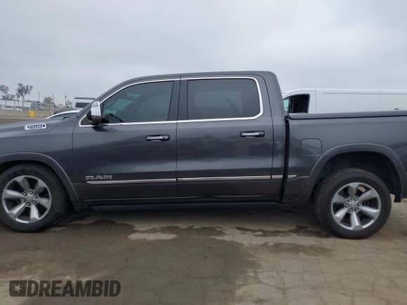 2019 Ram 1500 Limited z VIN 1C6SRFHT6KN773195, wystawiony jako IAAI lot #42421233 z przebiegiem 82 506 mil mil oraz . Historia ofert i sprzedaży dostępna na DreamBid. Obrazek 15.