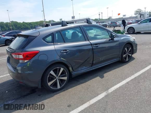 2018 Subaru Impreza Special Sports z VIN 4S3GTAM62J3702931, wystawiony jako IAAI lot #42615234 z przebiegiem 111 272 mil mil oraz . Historia ofert i sprzedaży dostępna na DreamBid. Obrazek 4.
