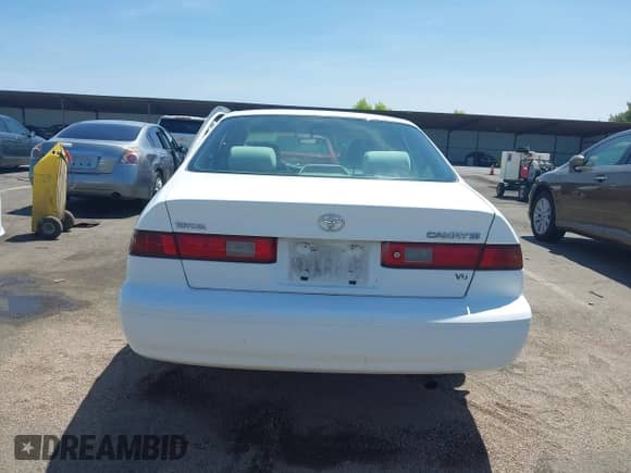 1997 Toyota Camry LE z VIN JT2BF22K6V0052184, wystawiony jako IAAI lot #42608245 z przebiegiem 188 191 mil mil oraz . Historia ofert i sprzedaży dostępna na DreamBid. Obrazek 16.