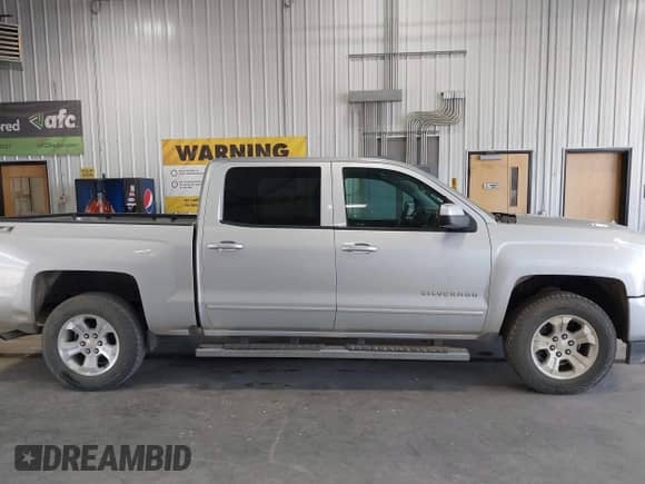 2016 Chevrolet Silverado 1500 LT with VIN 3GCUKREC0GG377694, listed as a IAAI auction lot 42638841 with 117,039 mi miles and . Bid and sale history available at DreamBid. Image 14.