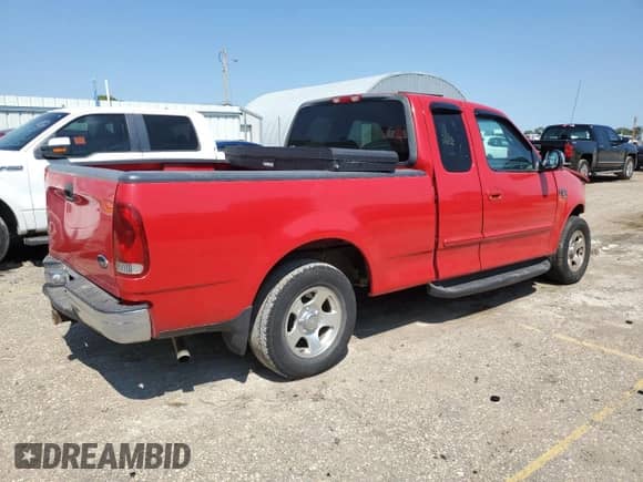 2000 Ford F-150 XL z VIN 2FTRX17L1YCA01879, wystawiony jako Copart lot #71352015 z przebiegiem 57 852 mil mil oraz Szkoda całkowita • Salvage title. Historia ofert i sprzedaży dostępna na DreamBid. Obrazek 3.
