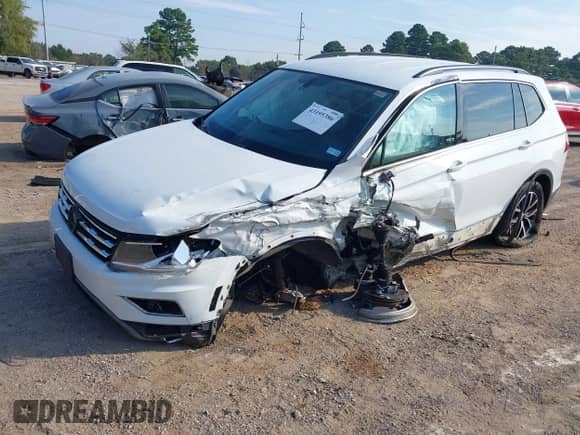 2021 Volkswagen Tiguan SE с VIN 3VV3B7AX2MM082054, выставлен на аукционе IAAI как лот 43195386 с пробегом 102 119 миль миль и . История ставок и продаж доступна на DreamBid. Изображение 2.