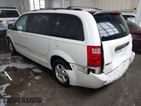 2008 Dodge Grand Caravan SXT z VIN 1D8HN54P48B146508, wystawiony jako IAAI lot #41868744 z przebiegiem 169 698 mil mil oraz . Historia ofert i sprzedaży dostępna na DreamBid. Obrazek 3.