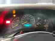 2001 Chevrolet Silverado 1500 LS z VIN 1GCEK19T81E219084, wystawiony jako Copart lot #80954195 z przebiegiem 216 520 mil mil oraz Czysty tytuł • Clean title. Historia ofert i sprzedaży dostępna na DreamBid. Obrazek 9.