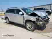 2014 Dodge Journey SXT with VIN 3C4PDCBB8ET104555, listed as a Copart auction lot 71114395 with 257,468 mi miles and Salvage title. Bid and sale history available at DreamBid. Image 4.