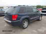 2009 Jeep Grand Cherokee Laredo with VIN 1J8GR48K79C515812, listed as a IAAI auction lot 43266705 with 116,109 mi miles and . Bid and sale history available at DreamBid. Image 4.