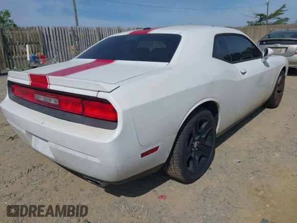 2013 Dodge Challenger SXT with VIN 2C3CDYAG3DH520016, listed as a IAAI auction lot 42117942 with 150,463 mi miles and . Bid and sale history available at DreamBid. Image 4.