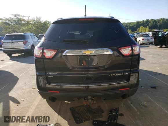 2015 Chevrolet Traverse LTZ с VIN 1GNKVJKD4FJ144774, выставлен на аукционе Copart как лот 72097325 с пробегом 186 009 миль миль и Списание • Salvage title. История ставок и продаж доступна на DreamBid. Изображение 6.