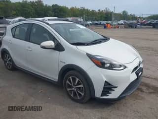 2018 Toyota Prius Four z VIN JTDKDTB33J1599266, wystawiony jako IAAI lot #43318116 z przebiegiem 249 866 mil mil oraz . Historia ofert i sprzedaży dostępna na DreamBid. Obrazek 1.