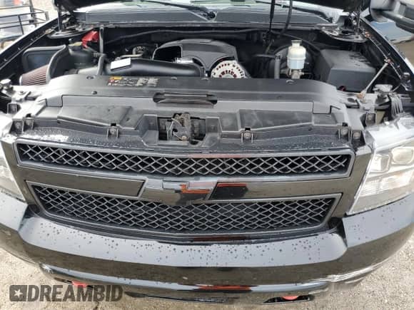 2013 Chevrolet Avalanche LTZ z VIN 3GNMCGE04DG350489, wystawiony jako Copart lot #82226825 z przebiegiem 198 732 mil mil oraz Szkoda całkowita • Salvage title. Historia ofert i sprzedaży dostępna na DreamBid. Obrazek 11.