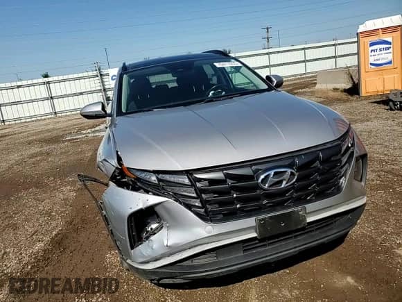 2022 Hyundai Tucson SEL Convenience with VIN KM8JFCA11NU013508, listed as a Copart auction lot 70411055 with 71,021 mi miles and Salvage title. Bid and sale history available at DreamBid. Image 13.
