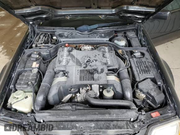 1992 Mercedes-Benz 500 z VIN WDBFA66E2NF038636, wystawiony jako Copart lot #55522605 z przebiegiem 92 002 mil mil oraz Szkoda całkowita • Salvage title. Historia ofert i sprzedaży dostępna na DreamBid. Obrazek 11.