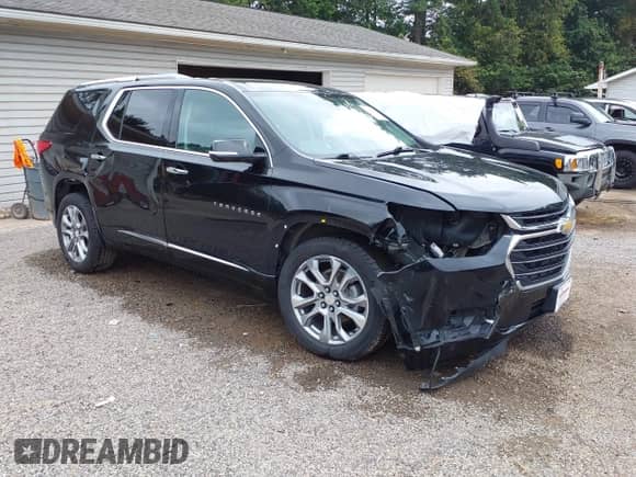 2018 Chevrolet Traverse Premier with VIN 1GNEVJKW4JJ256773, listed as a IAAI auction lot 43053281 with 116,244 mi miles and . Bid and sale history available at DreamBid. Image 1.