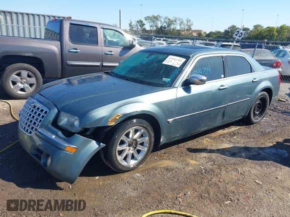 2005 Chrysler 300 C with VIN 2C3AA63H95H524955, listed as a IAAI auction lot 43444704 with 229,566 mi miles and . Bid and sale history available at DreamBid. Image 2.