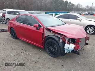 2021 Toyota Camry XSE with VIN 4T1K61AK4MU478042, listed as a IAAI auction lot 41526408 with 106,937 mi miles and . Bid and sale history available at DreamBid. Image 1.