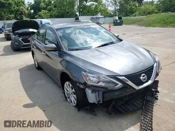 2019 Nissan Sentra SV z VIN 3N1AB7APXKY318044, wystawiony jako Copart lot #67408985 z przebiegiem 107 171 mil mil oraz Szkoda całkowita • Salvage title. Historia ofert i sprzedaży dostępna na DreamBid. Obrazek 14.