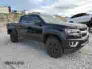 2015 Chevrolet Colorado 4WD LT z VIN 1GCGTBE31F1120168, wystawiony jako Copart lot #85118915 z przebiegiem 168 101 mil mil oraz Szkoda całkowita • Salvage title. Historia ofert i sprzedaży dostępna na DreamBid. Obrazek 4.