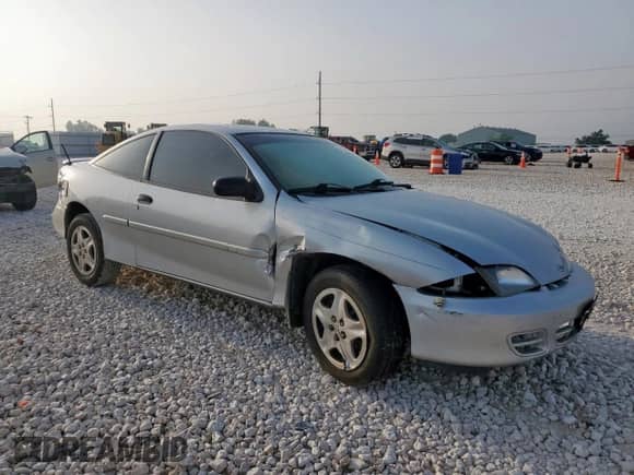 2000 Chevrolet Cavalier with VIN 1G1JC1243Y7363101, listed as a Copart auction lot 57591485 with 252,742 mi miles and Salvage title. Bid and sale history available at DreamBid. Image 4.