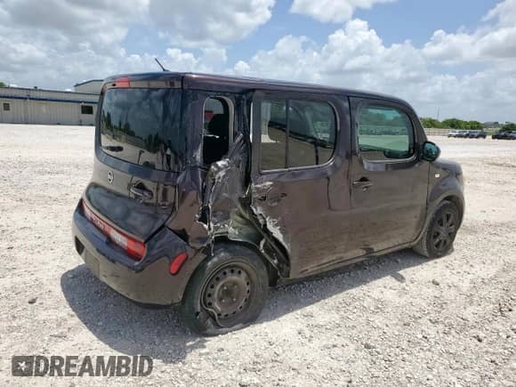 2012 Nissan Cube SL с VIN JN8AZ2KRXCT253710, выставлен на аукционе Copart как лот 61392915 с пробегом 164 438 миль миль и Списание • Salvage title. История ставок и продаж доступна на DreamBid. Изображение 3.