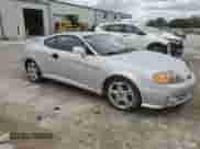 2004 Hyundai Tiburon GT с VIN KMHHN65F54U112744, выставлен на аукционе Copart как лот 57850495 с пробегом 103 409 миль миль и Списание • Salvage title. История ставок и продаж доступна на DreamBid. Изображение 4.