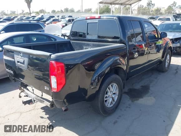 2017 Nissan Frontier SV with VIN 1N6AD0ERXHN746452, listed as a IAAI auction lot 43125142 with 148,371 mi miles and . Bid and sale history available at DreamBid. Image 4.