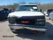 1996 GMC Sierra 1500 z VIN 1GTGC33R4TF018147, wystawiony jako IAAI lot #41612770 z przebiegiem 106 443 mil mil oraz . Historia ofert i sprzedaży dostępna na DreamBid. Obrazek 12.