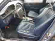 1990 Mercedes-Benz 300 z VIN WDBEB28D9LB167760, wystawiony jako Copart lot #50052815 z przebiegiem 310 217 mil mil oraz Czysty tytuł • Clean title. Historia ofert i sprzedaży dostępna na DreamBid. Obrazek 7.