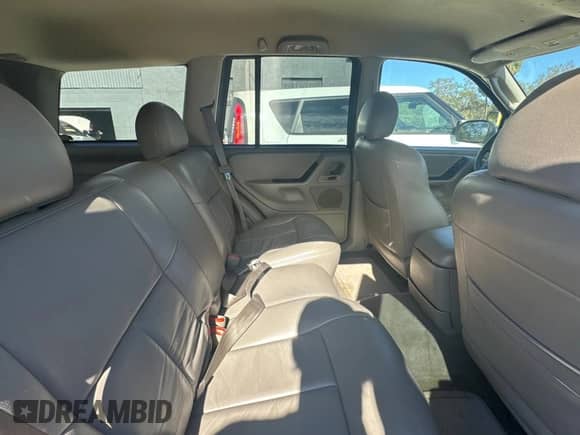 2004 Jeep Grand Cherokee Laredo z VIN 1J4GX48N24C436753, wystawiony jako Copart lot #88142905 z przebiegiem 114 022 mil mil oraz Czysty tytuł • Clean title. Historia ofert i sprzedaży dostępna na DreamBid. Obrazek 6.