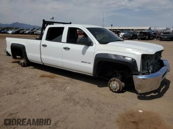 2015 Chevrolet Silverado 2500HD Work Truck z VIN 1GC1KUEGXFF564076, wystawiony jako Copart lot #63318565 z przebiegiem 117 533 mil mil oraz Szkoda całkowita • Salvage title. Historia ofert i sprzedaży dostępna na DreamBid. Obrazek 4.