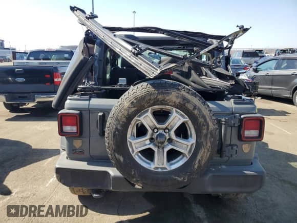 2023 Jeep Wrangler Sport S with VIN 1C4GJXANXPW609778, listed as a Copart auction lot 48559505 with Not provided miles and Salvage title. Bid and sale history available at DreamBid. Image 6.