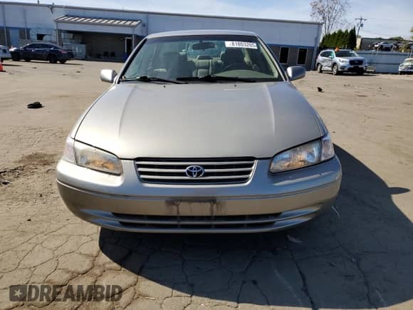1999 Toyota Camry LE with VIN JT2BF28K7X0198085, listed as a Copart auction lot 81803205 with 70,214 mi miles and Salvage title. Bid and sale history available at DreamBid. Image 5.