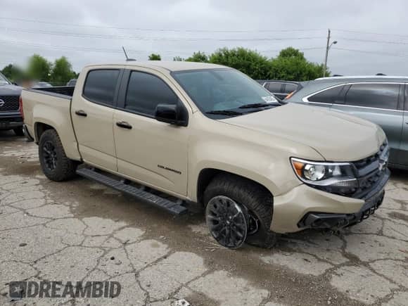 2022 Chevrolet Colorado 4WD Z71 with VIN 1GCGTDEN5N1331854, listed as a Copart auction lot 64928465 with 6,859 mi miles and Salvage title. Bid and sale history available at DreamBid. Image 4.