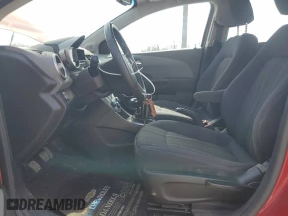 2012 Chevrolet Sonic LT z VIN 1G1JD5SB1C4160396, wystawiony jako Copart lot #52098365 z przebiegiem 125 733 mil mil oraz Szkoda całkowita • Salvage title. Historia ofert i sprzedaży dostępna na DreamBid. Obrazek 7.