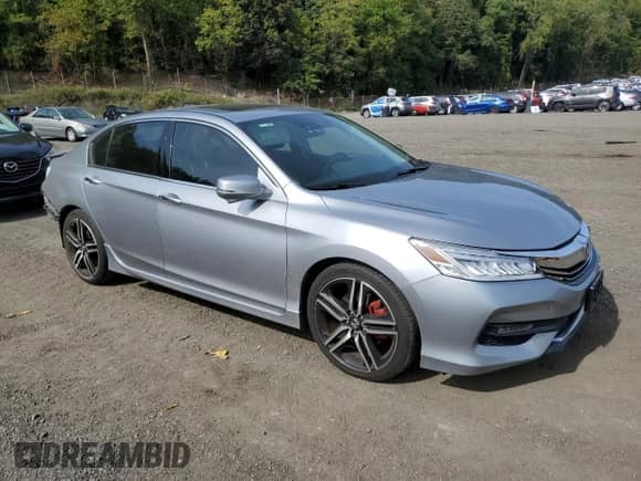 2016 Honda Accord Touring with VIN 1HGCR3F96GA012556, listed as a Copart auction lot 84565315 with 90,373 mi miles and Salvage title. Bid and sale history available at DreamBid. Image 4.
