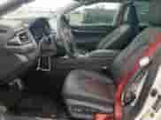 2023 Toyota Camry TRD with VIN 4T1KZ1AK6PU075949, listed as a Copart auction lot 70565865 with 52,356 mi miles and Salvage title. Bid and sale history available at DreamBid. Image 7.