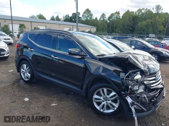 2014 Hyundai Santa Fe z VIN 5XYZUDLA7EG156349, wystawiony jako IAAI lot #43368098 z przebiegiem 128 126 mil mil oraz . Historia ofert i sprzedaży dostępna na DreamBid. Obrazek 1.