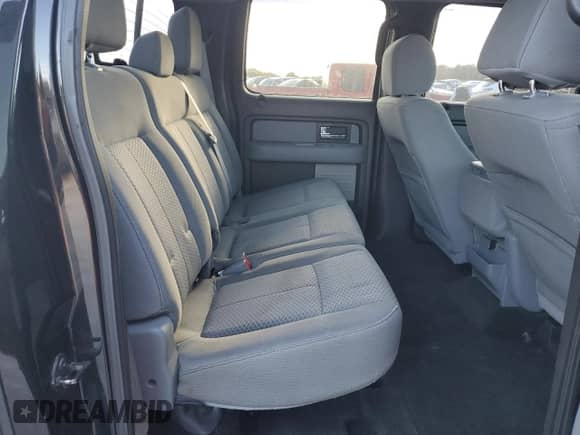 2013 Ford F-150 XLT с VIN 1FTFW1ETXDFB34437, выставлен на аукционе Copart как лот 82696165 с пробегом 148 000 миль миль и Списание • Salvage title. История ставок и продаж доступна на DreamBid. Изображение 10.