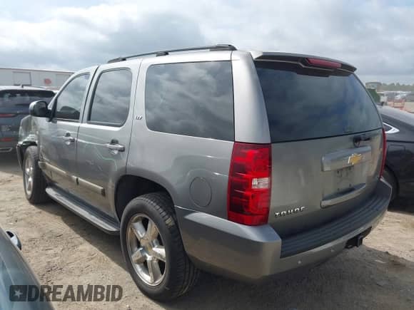 2007 Chevrolet Tahoe LT z VIN 1GNFK13057J113461, wystawiony jako IAAI lot #42753326 z przebiegiem 160 268 mil mil oraz . Historia ofert i sprzedaży dostępna na DreamBid. Obrazek 3.